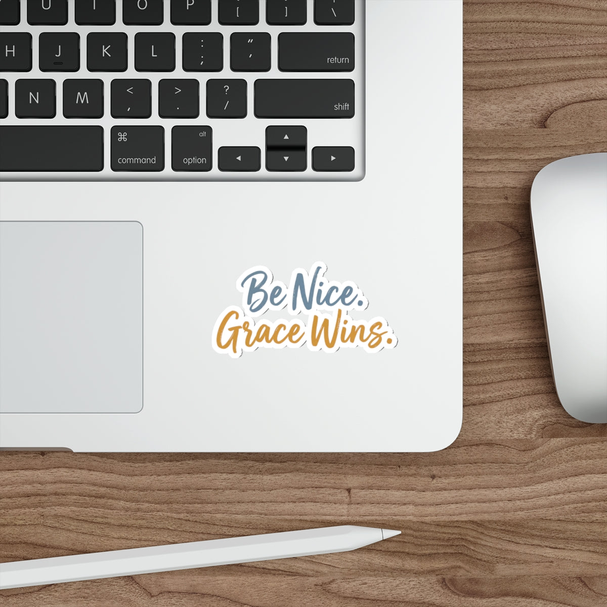 Be Nice Grace Wins Die-Cut Sticker on a laptop