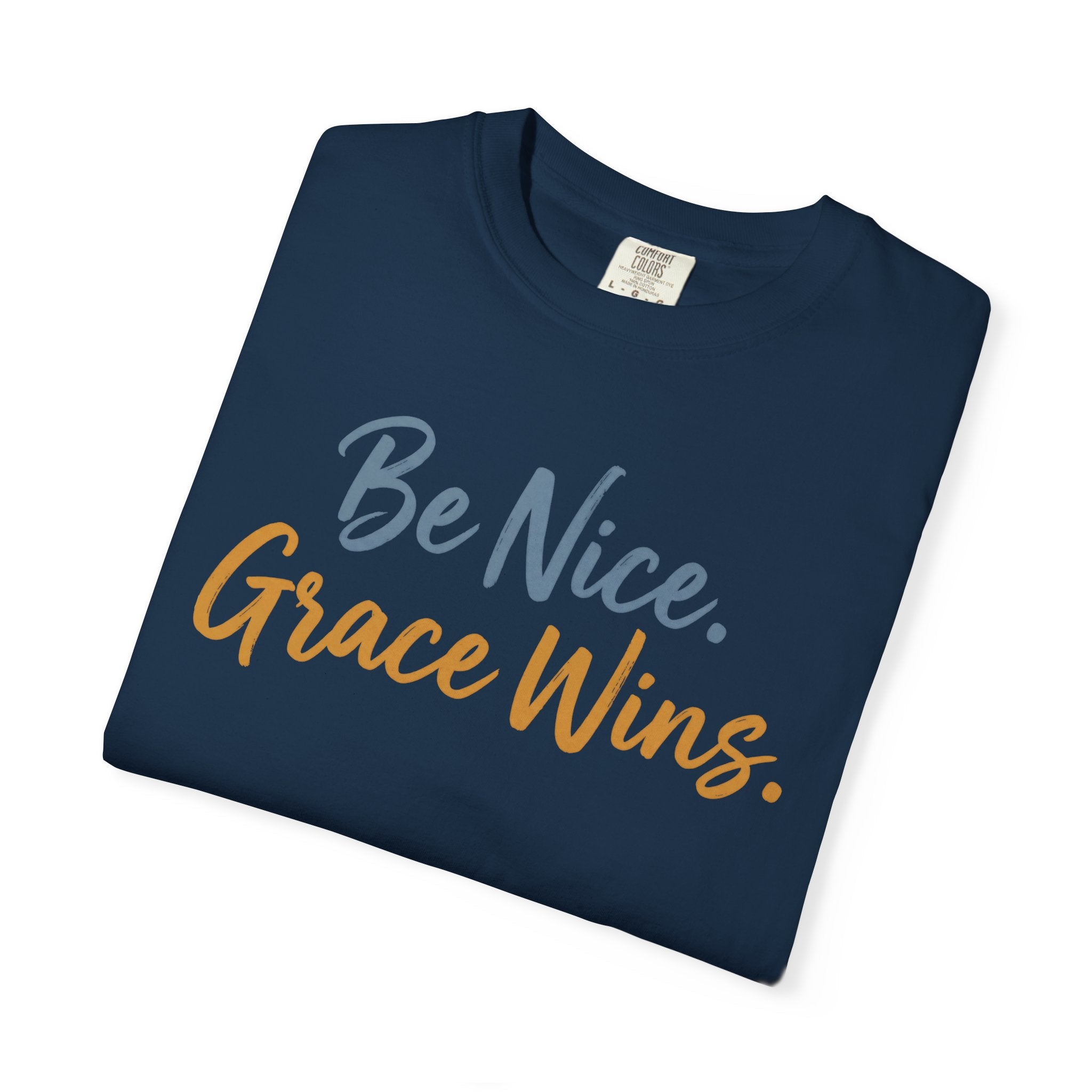 Be Nice Grace Wins Tee in Navy, folded view