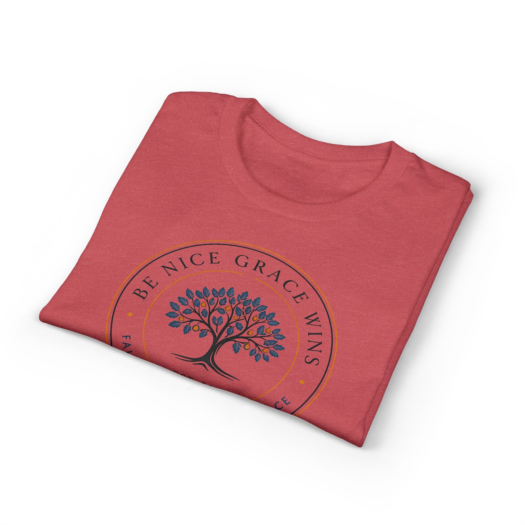 Faith Kindness Grace Performance Tee in Coral, folded view