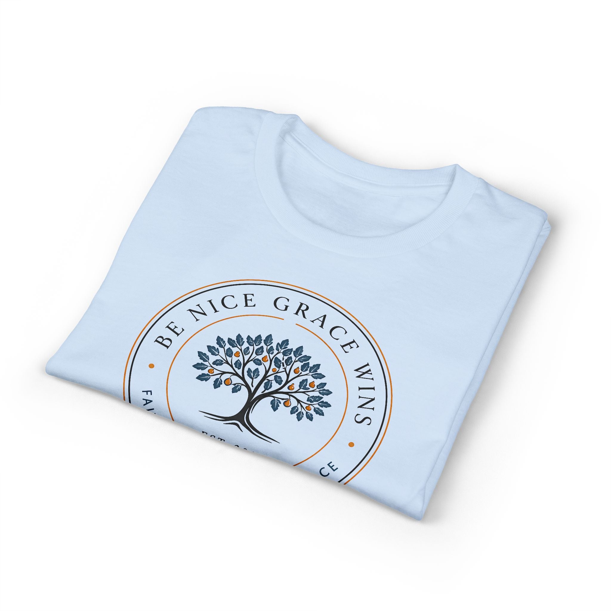 Faith Kindness Grace Performance Tee in Light Blue, folded view