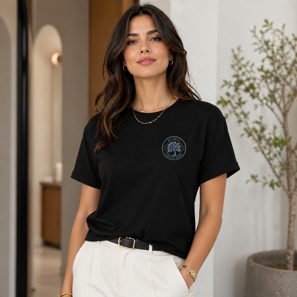 Woman wearing the Fig Tree Pocket Tee in Black indoors