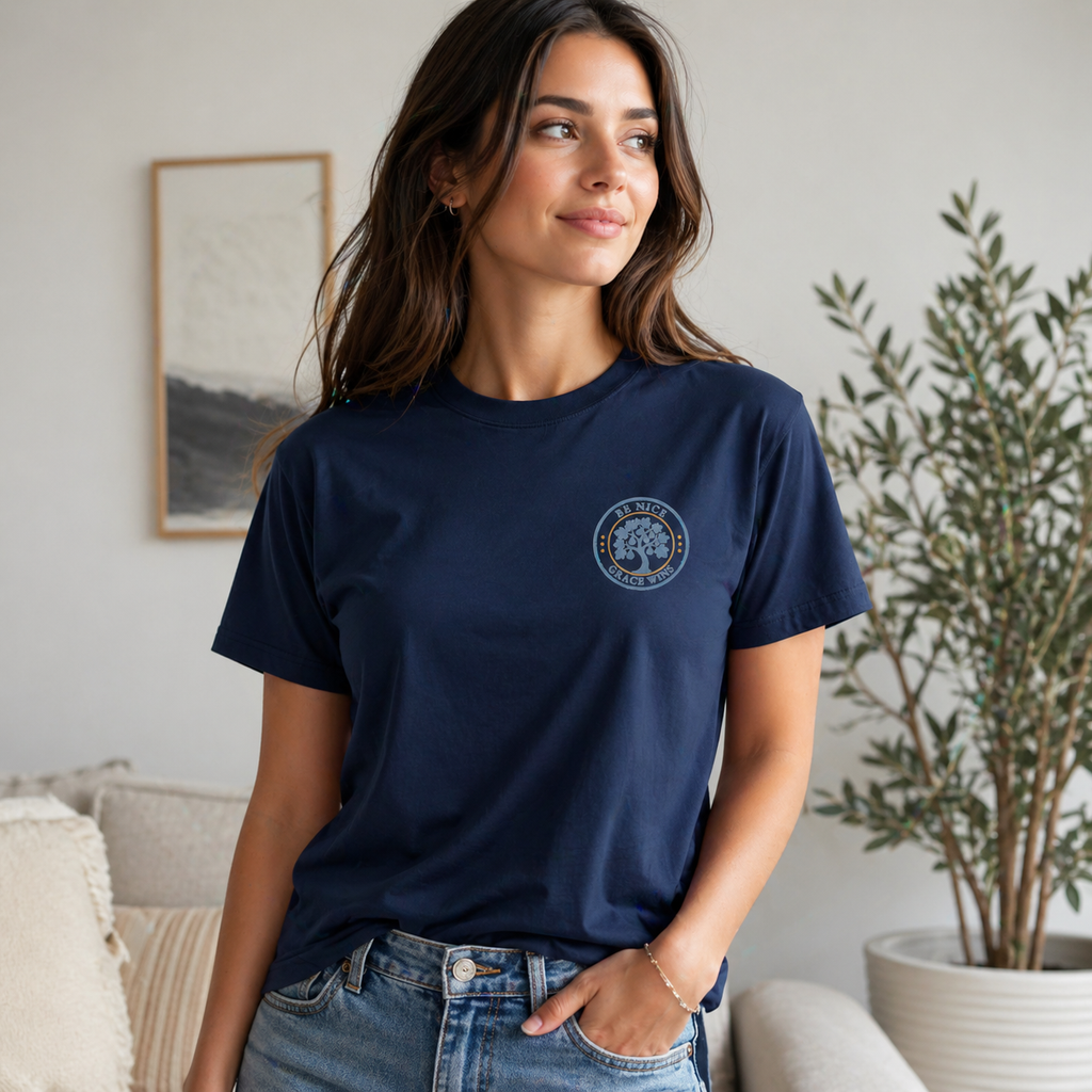 Woman wearing the Fig Tree Pocket Tee in Navy in a living room