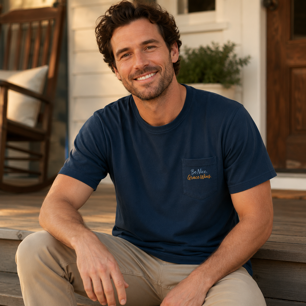 Man wearing the Everyday Pocket Tee in Navy on a porch