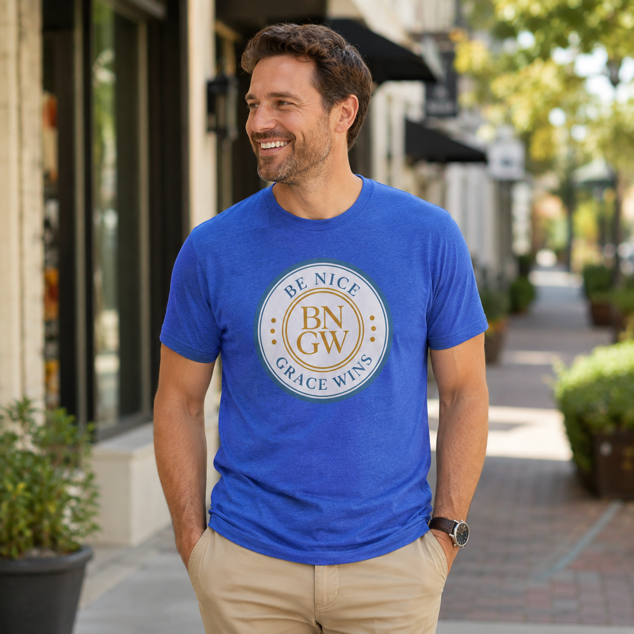 Man wearing the Tri-Blend Tee in Royal Blue on a sunny sidewalk