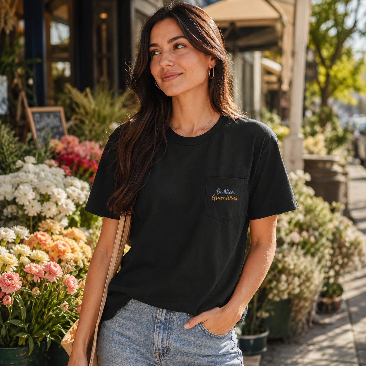 Woman wearing the Everyday Pocket Tee in Black at a flower market
